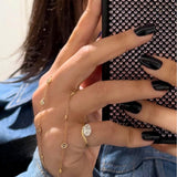 SOLITAIRE WAVE PINKY RING